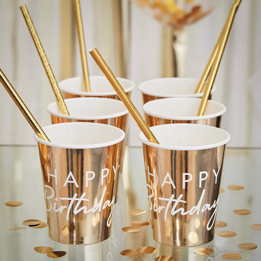 Tazas doradas de feliz cumpleaños