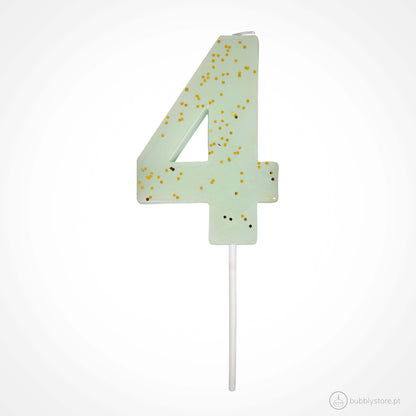 Velas de aniversário verde água com mini confetis dourados, com altura 7,6cm. Cada embalagem contém 1 unidade.