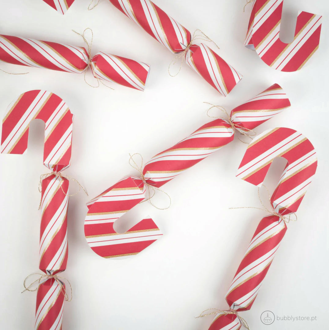 Conjunto de 6 crackers em forma de bengala para festa de Natal.
Cada cracker contém um chapéu de festa vermelho ou rosa, uma anedota e um presente.