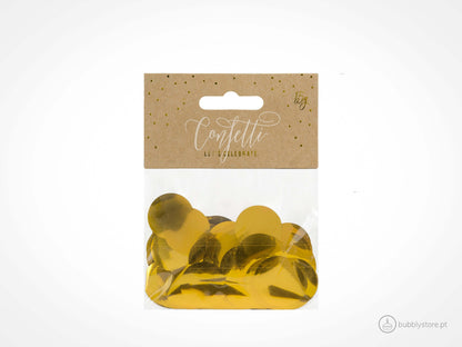 Confetis de papel metálico dourado, com diâmetro de 2,5cm. Cada embalagem contém 15g.
