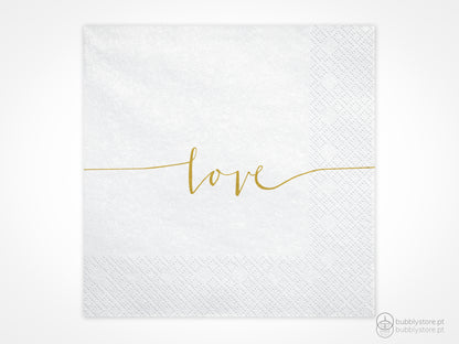 Guardanapos brancos com letras douradas, com a medida de 16,5 x 16,5 cm. Cada embalagem é composta por 20 unidades.