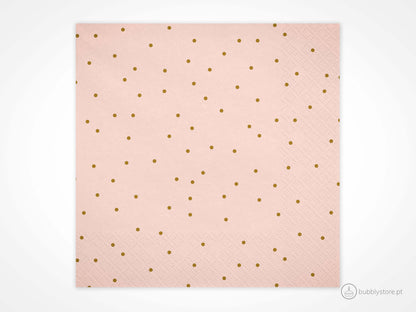 Guardanapos rosa com bolinhas douradas, com a medida de 16,5 x 16,5 cm. Cada embalagem é composta por 20 unidades.