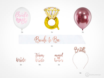 Kit de festa Bride to Be para festa de Despedida de Solteira.
Inclui Faixa, Bandolete, balão anel, Tatuagens, balões transparentes e balões rose gold.